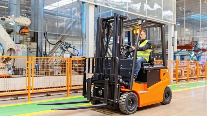 Man operating a fork lift