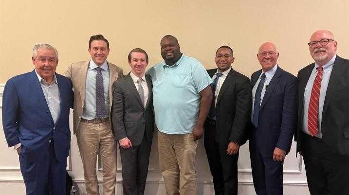 Morgan & Morgan attorneys Evan Rosenberg, Keith Mitnik, John Morgan, Riley Snider and Edward Hardrick