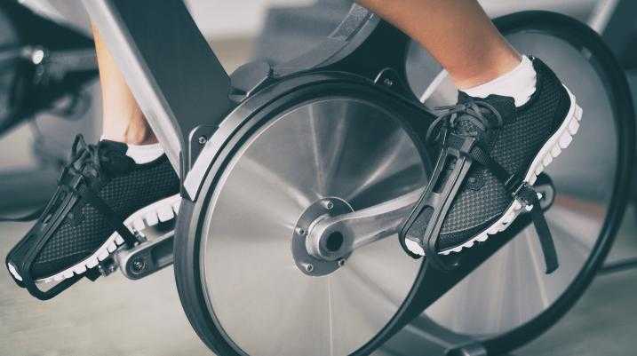 Person riding a stationary bike