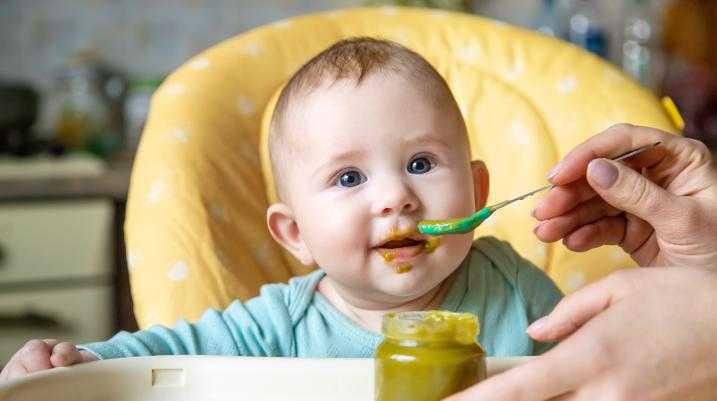 Baby being fed