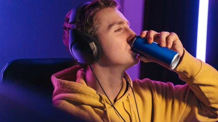 Man drinking out of a can