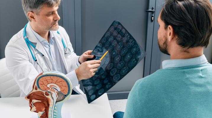 Doctor talking to patient with Nerve damage