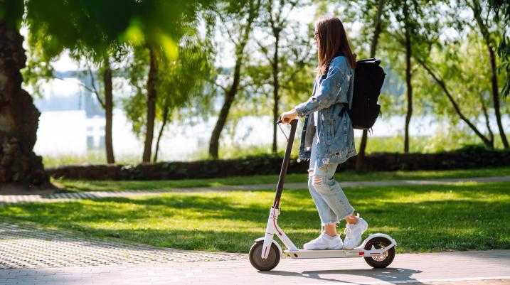 Woman riding an electric scooter