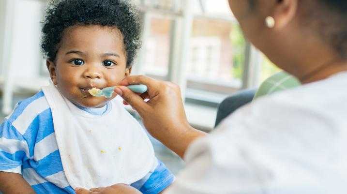 Baby being fed