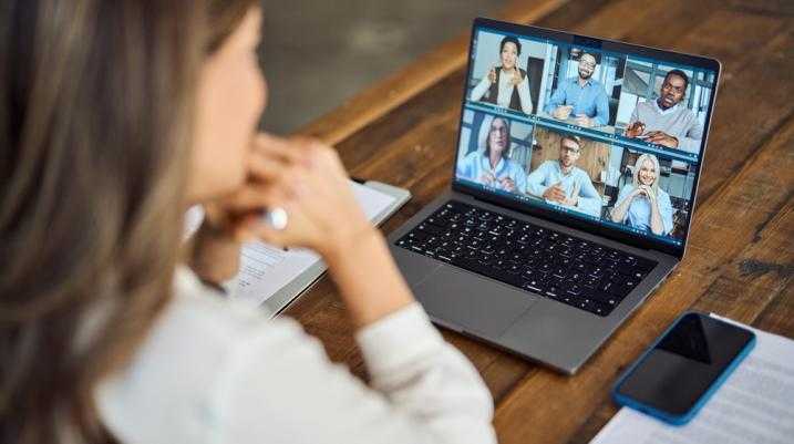 remote worker on a zoom call with her team