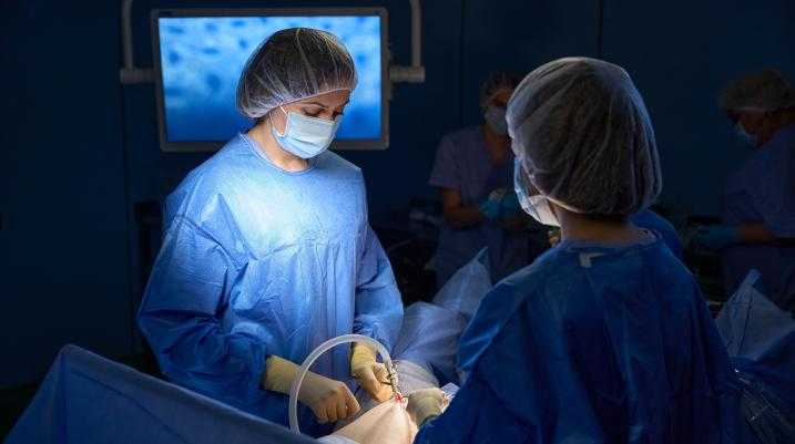 Doctors performing surgery