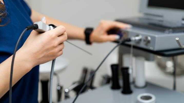 Medical professional using a medical device