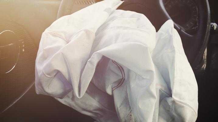Deflated airbag in a car