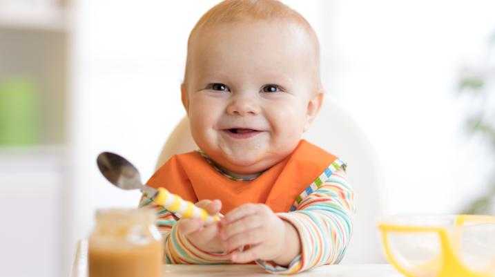 Baby eating baby food