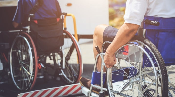 wheelchairs onto the bus