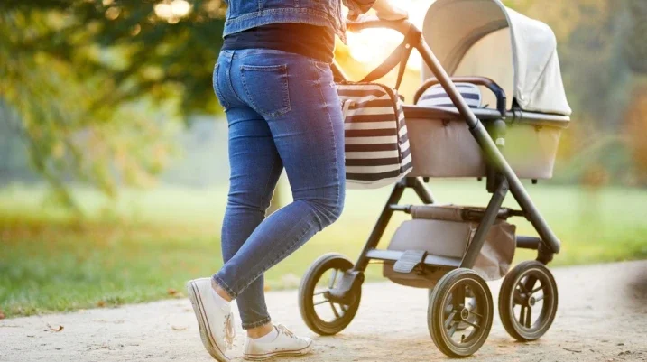 walking a baby in the park