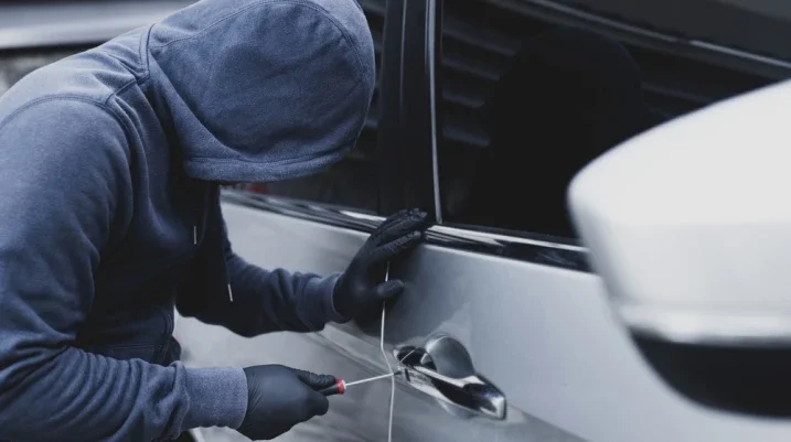 Someone stealing a car