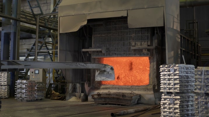 Metal being melted at a factory