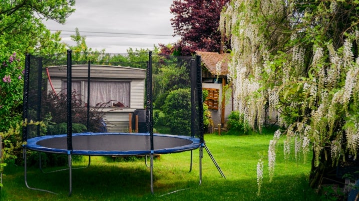 Trampoline in a backyard