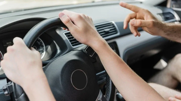teen driver with parent