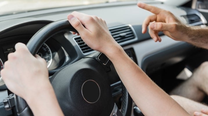 teen driver with parent