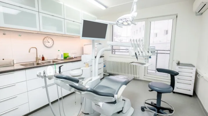 Comfortable Dental Chair Unit with Luxury Dental Chair in Dentist doctor clinic modern medical ward. Health care, medicare industry, heathcare technology concept image