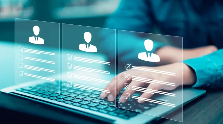 businessman using laptop with Personal information file storage concept ,HR checklists of employees Corporate data management system and document management system with employee privacy. 
