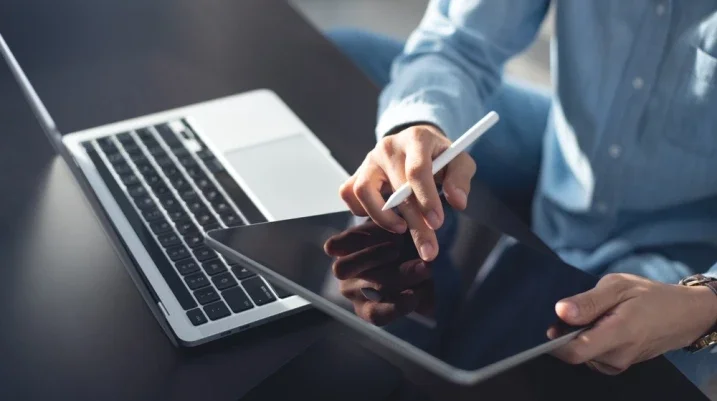 employee using their laptop and working