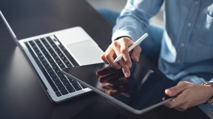 employee using their laptop and working