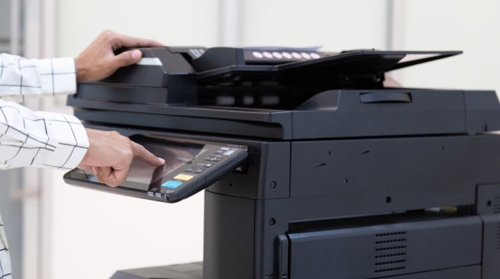 Someone using a printer