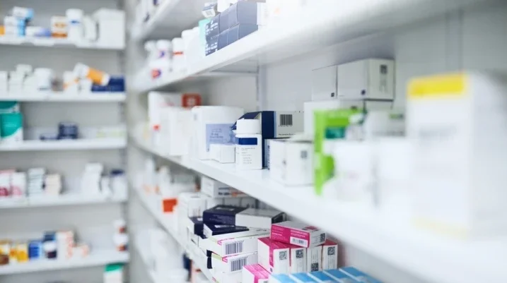 shelves of medication in a pharmacy