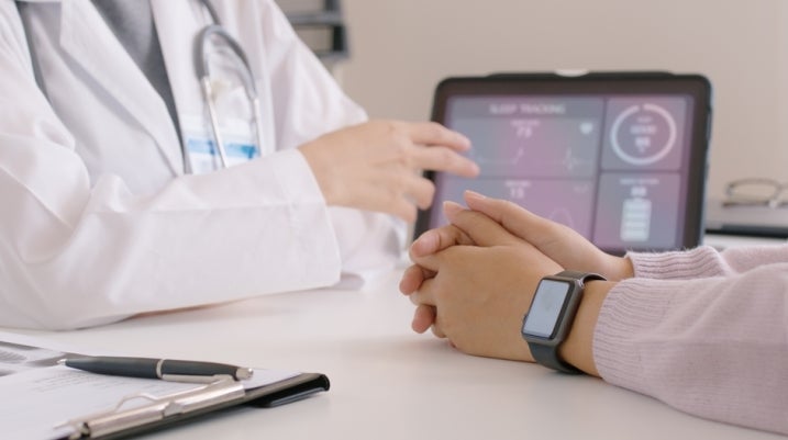 doctor telling patient their diagnosis