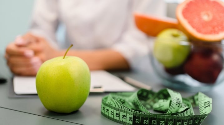 apple, measuring tape and other fruit