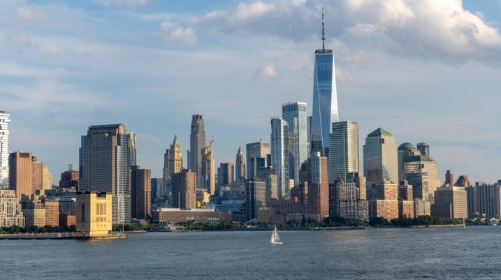New York City skyline as seen from the Hudson River. Lower Manhattan with One World Trade Center as tallest building in the western hemisphere