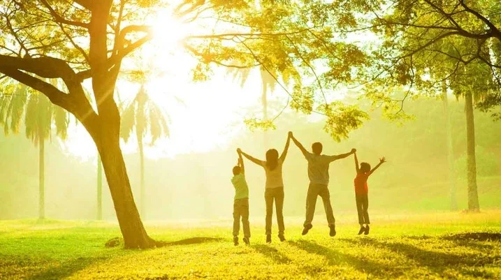 Morgan & Morgan Sponsors Safe Haven for Abuse Survivors - A survivors jumping and raising their hands in joy.
