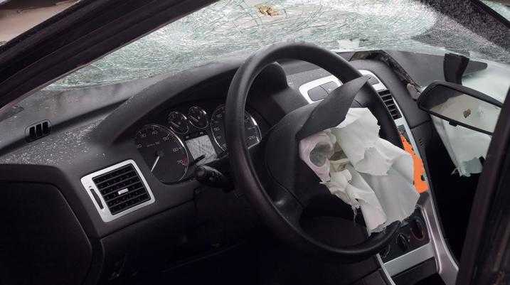 NHTSA Head Says Automakers Have “Ultimate Responsibility” for Airbag Repairs - The car's airbag deployed after a collision.