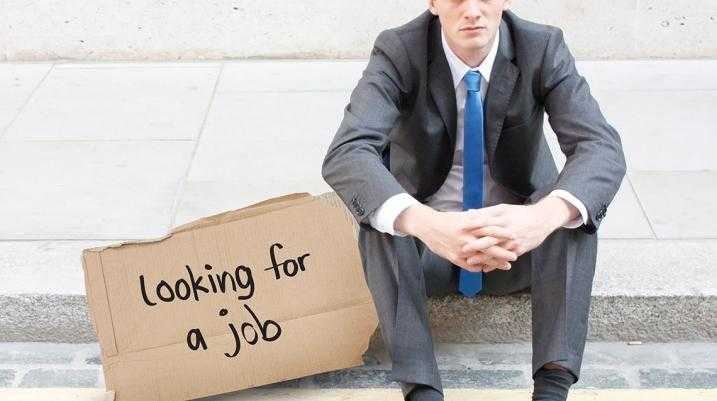 Long-term Unemployment Casts a Shadow Over New Yorkers - A man sitting looking for a job