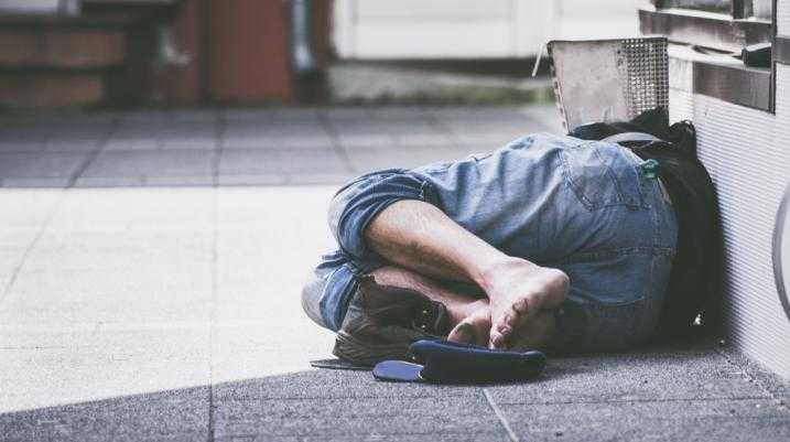 Homeless person on floor