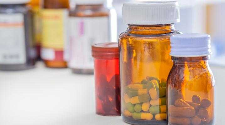 Morgan & Morgan to Help Kentucky AG in Fight to End Opioid Crisis - A tablet enclosed within the bottle.
