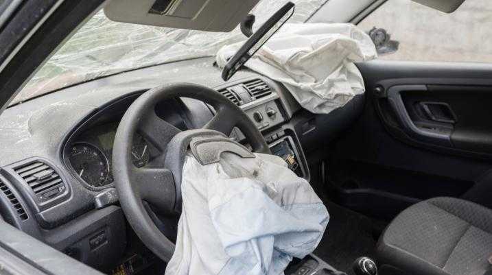 steering wheel with deflated deployed airbag