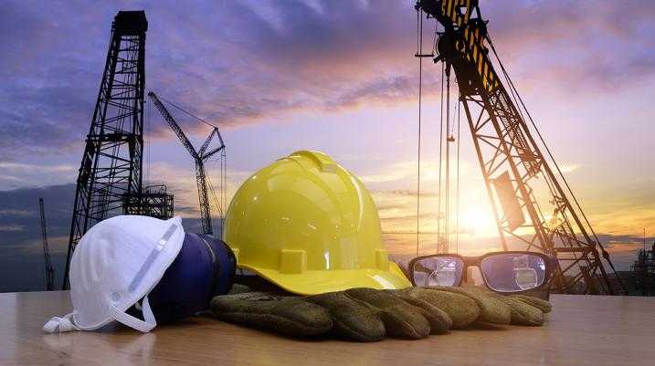 Construction Hats in front of site