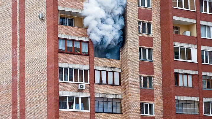 Smoke coming out Apartment Building