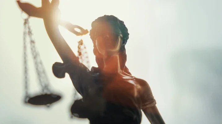 statue with scales of justice