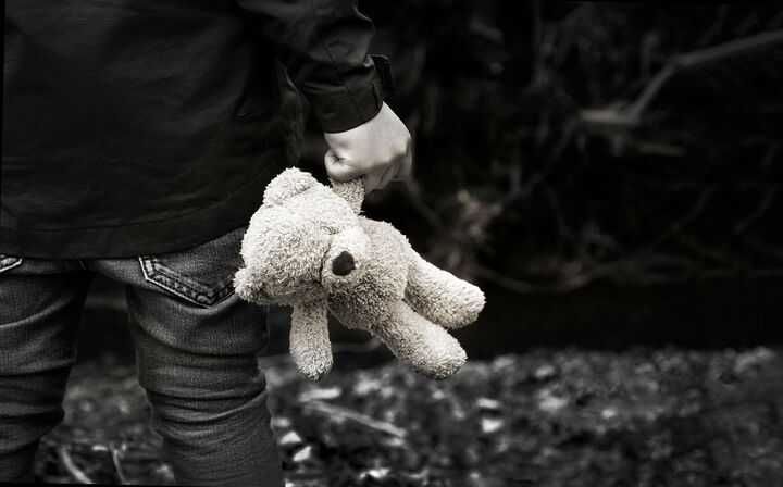 Person holding teddy bear