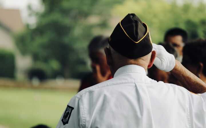 Veterans' Benefits - Veteran Saluting to the Flag