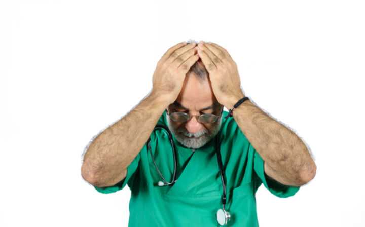 Medical Malpractice Negligence Settlements - What You Need to Know - stressed man