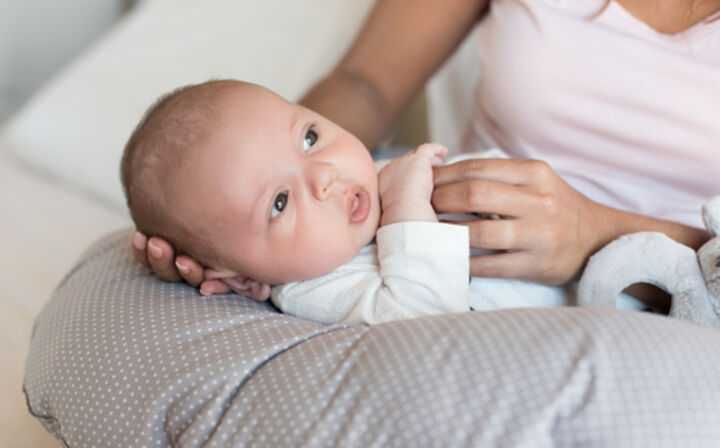 The Boppy Pillow Recall Lawsuit - newborn laying on a boppy pillow