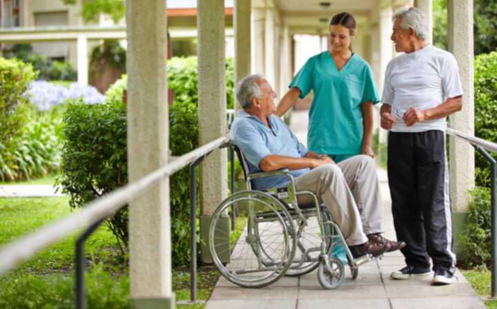 Elder Abuse in Assisted Living Facilities Lawyer - patient with 2 caregivers