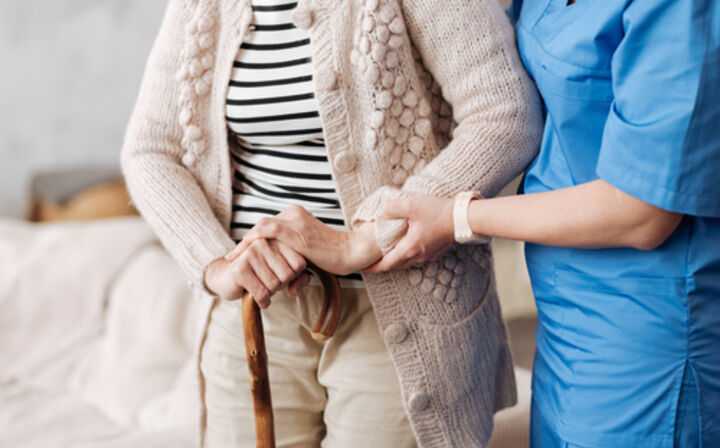 How to Detect Nursing Home Abuse - nurse with elder patient