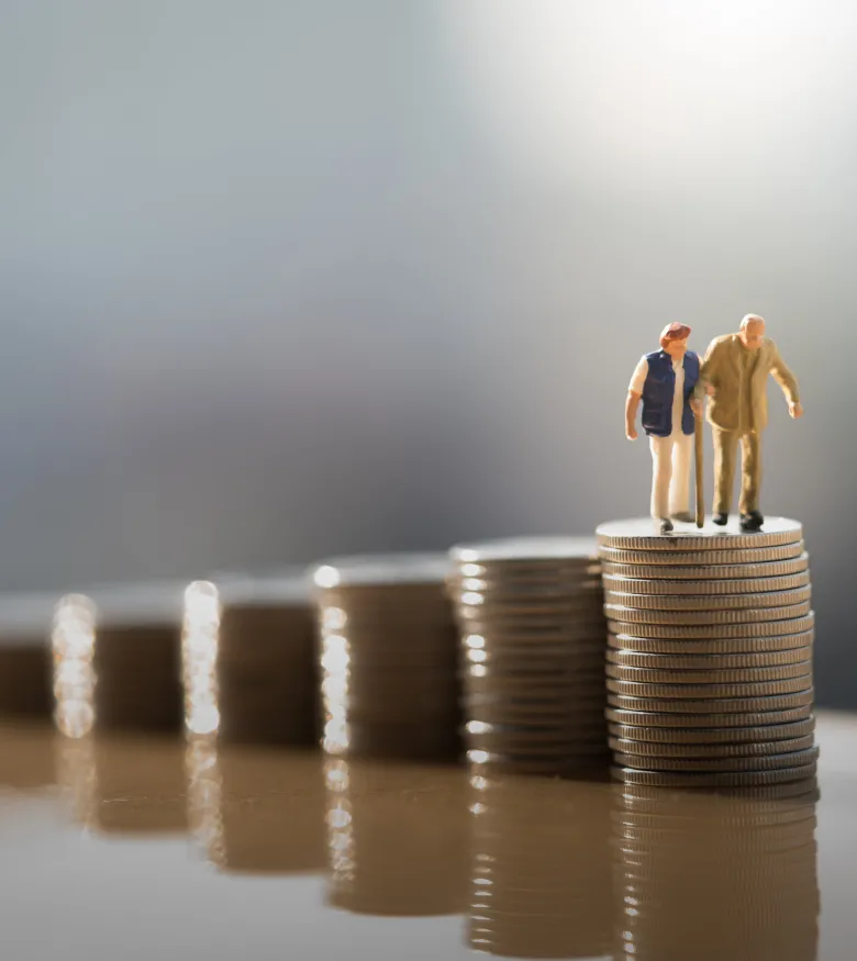 Tampa Veterans' Disability Lawyers - Little figures on stack of coins