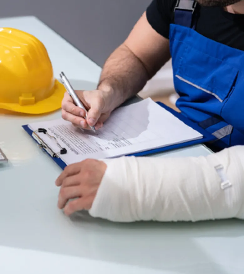 Social Security Disability Lawyers in Charleston - Construction Worker filling Social Security Disability Forms
