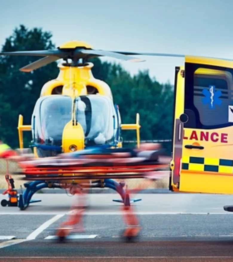 Emergency responders and a helicopter at an accident scene, highlighting the need for a Helicopter Accident Attorney in Gainesville to provide legal assistance.