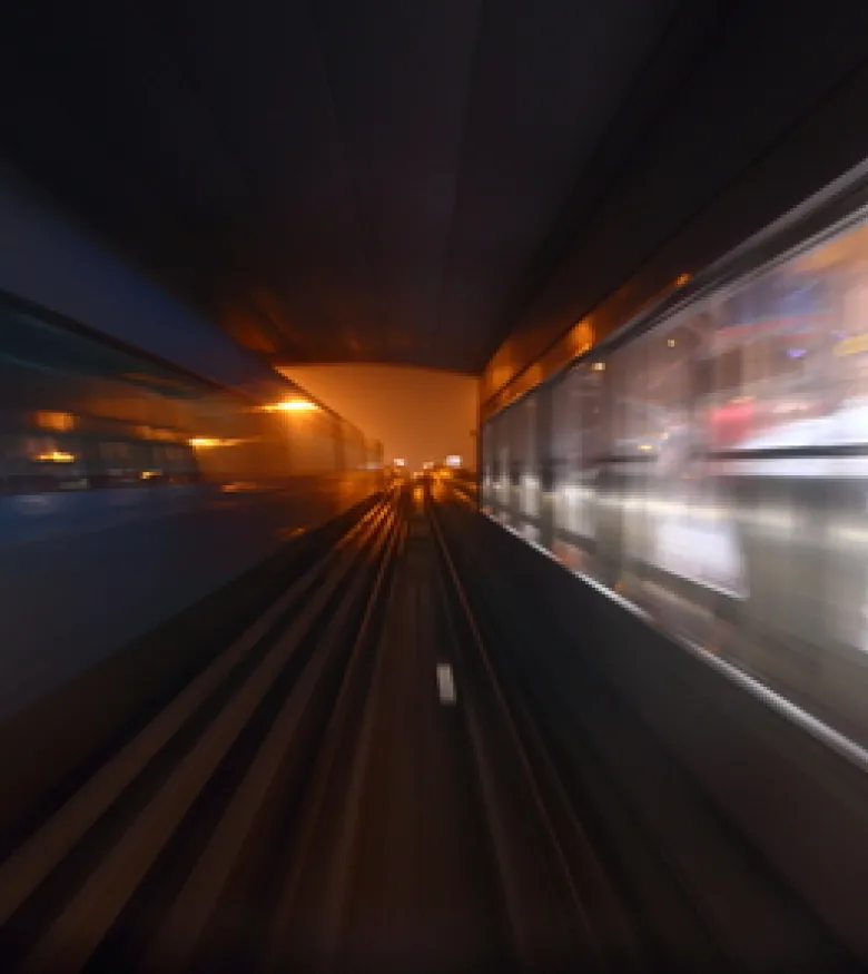Blurry subway train. Need a Queens Subway Accident Lawyer?