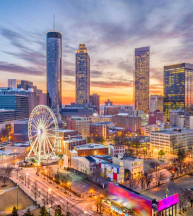 Vibrant Atlanta skyline at sunset, a prime location for a personal injury lawyer.