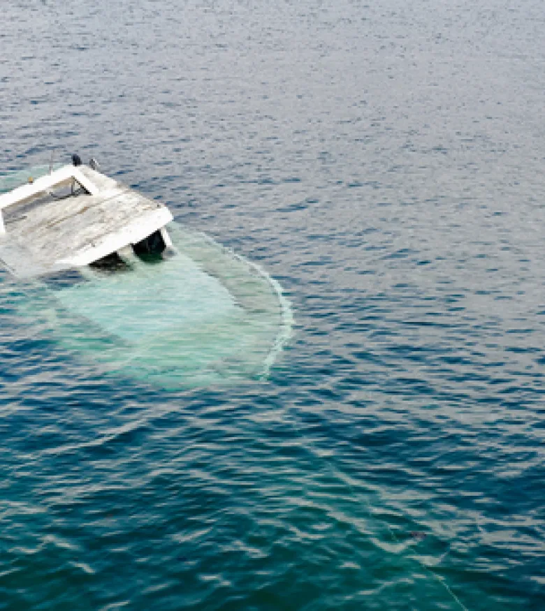 Boat sinking showing the need for a boating accident attorney in Gainesville.